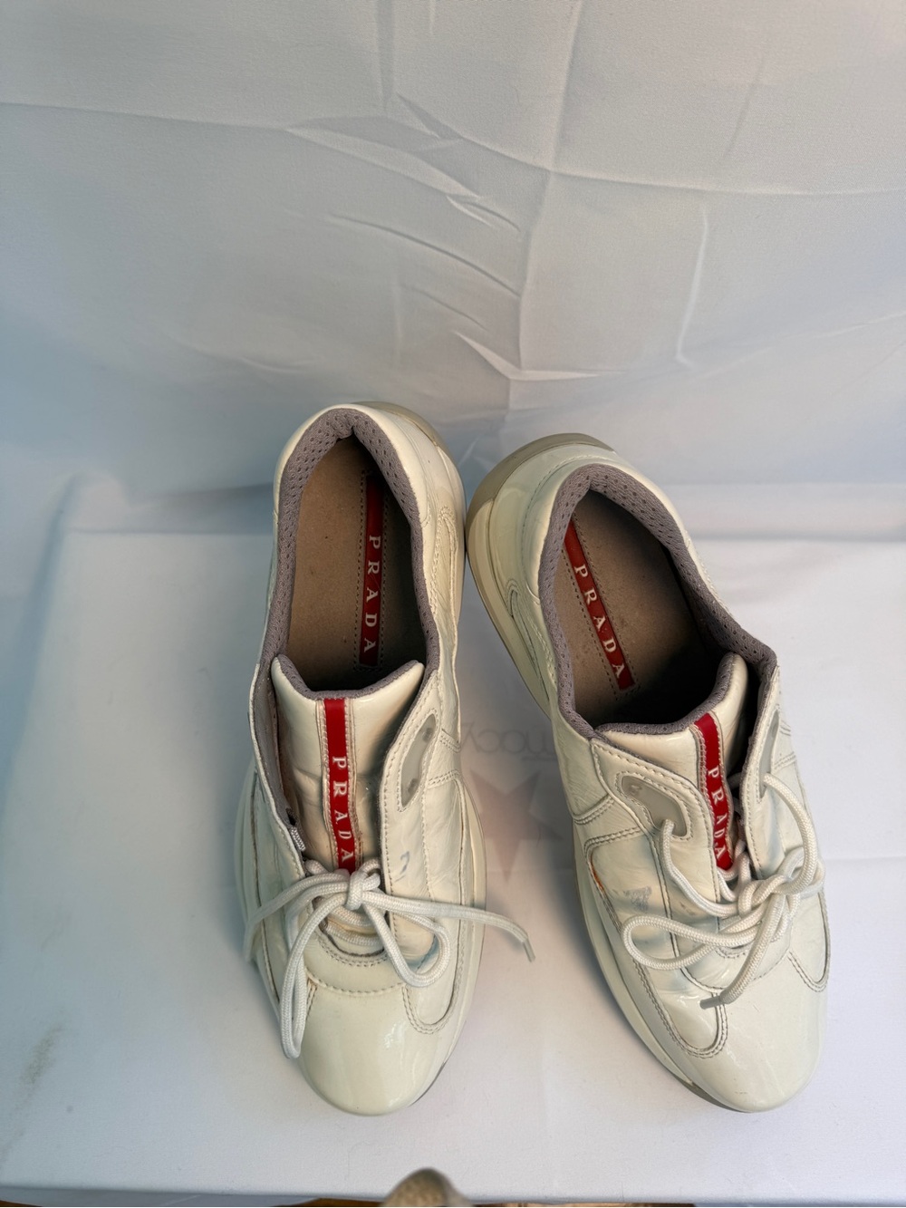 Prada White Leather Women’s Sneakers with Red Logo Stripe. Used once.